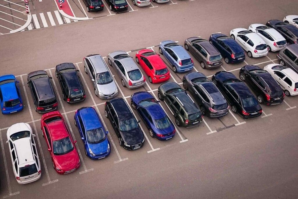 Parking lot with well-maintained asphalt paving for retail and shopping centers.