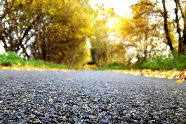 Expert asphalt paving for durable driveways and roads in About area.